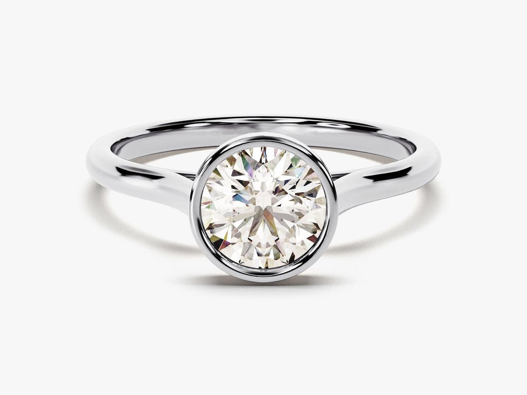 IGI certified round cut diamond in bezel engagement ring setting