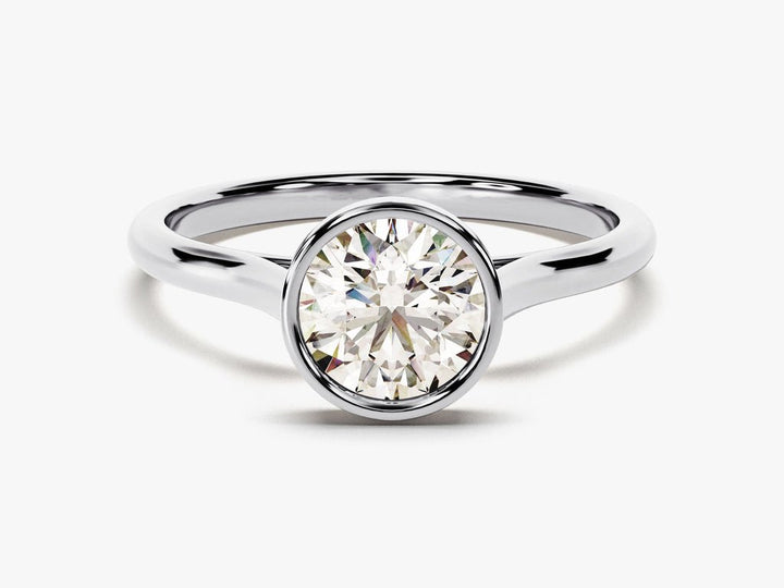 IGI certified round cut diamond in bezel engagement ring setting