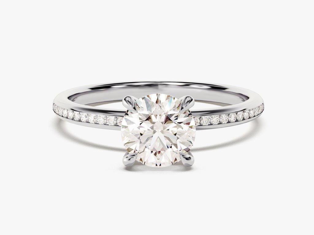 Round solitaire engagement ring shown on hand for true-to-life sizing