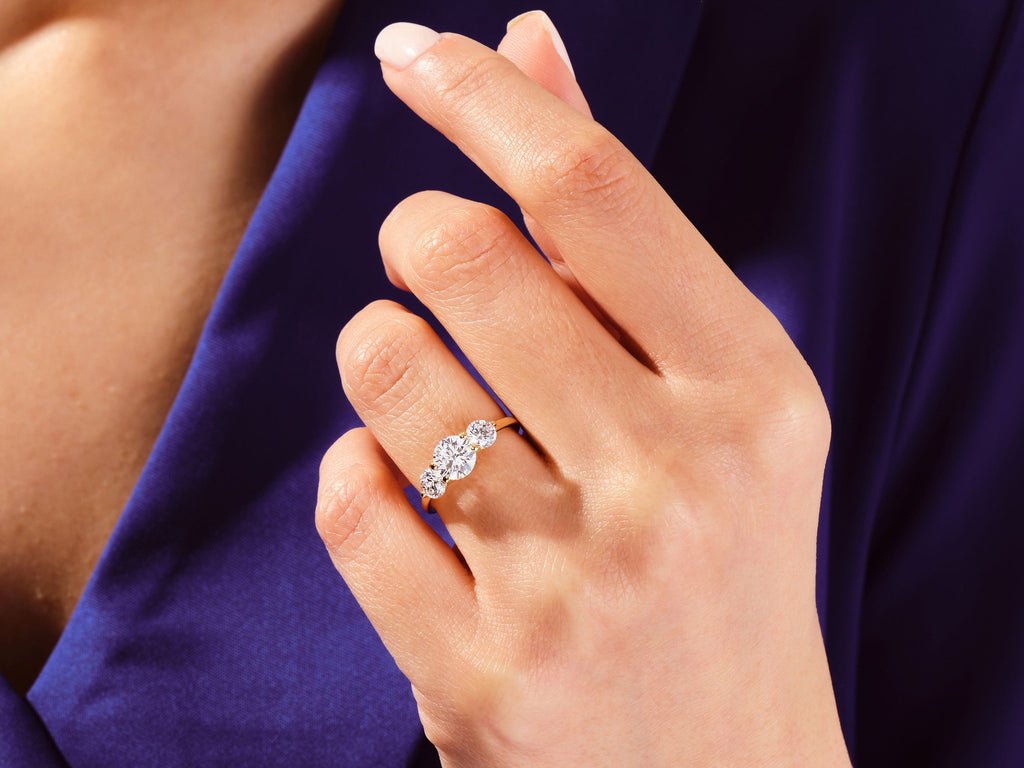 Round solitaire engagement ring with IGI certificate and packaging