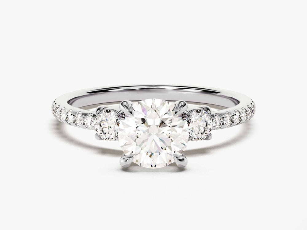 Round pave engagement ring photographed in natural light