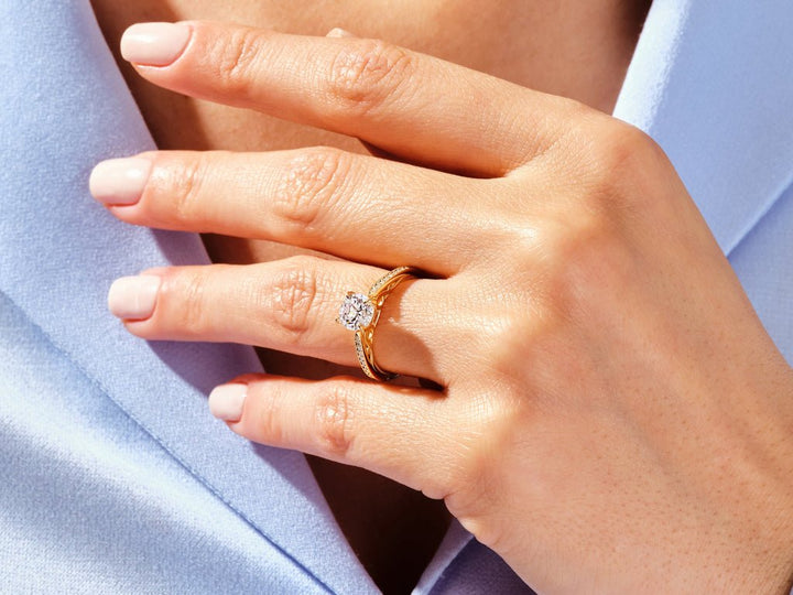 Premium round cut vintage engagement ring crafted in solid gold