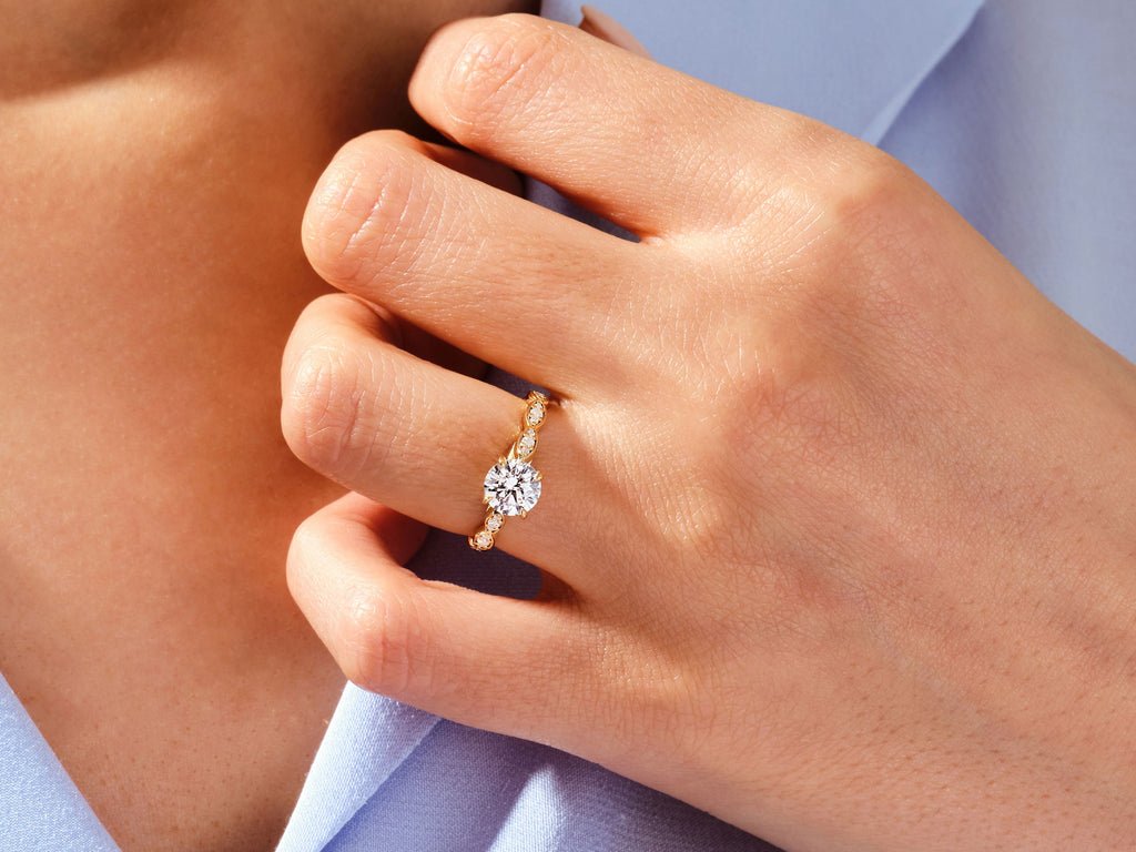 Round cut engagement ring side view showing band detail