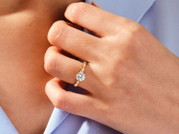 Round cut engagement ring side view showing band detail