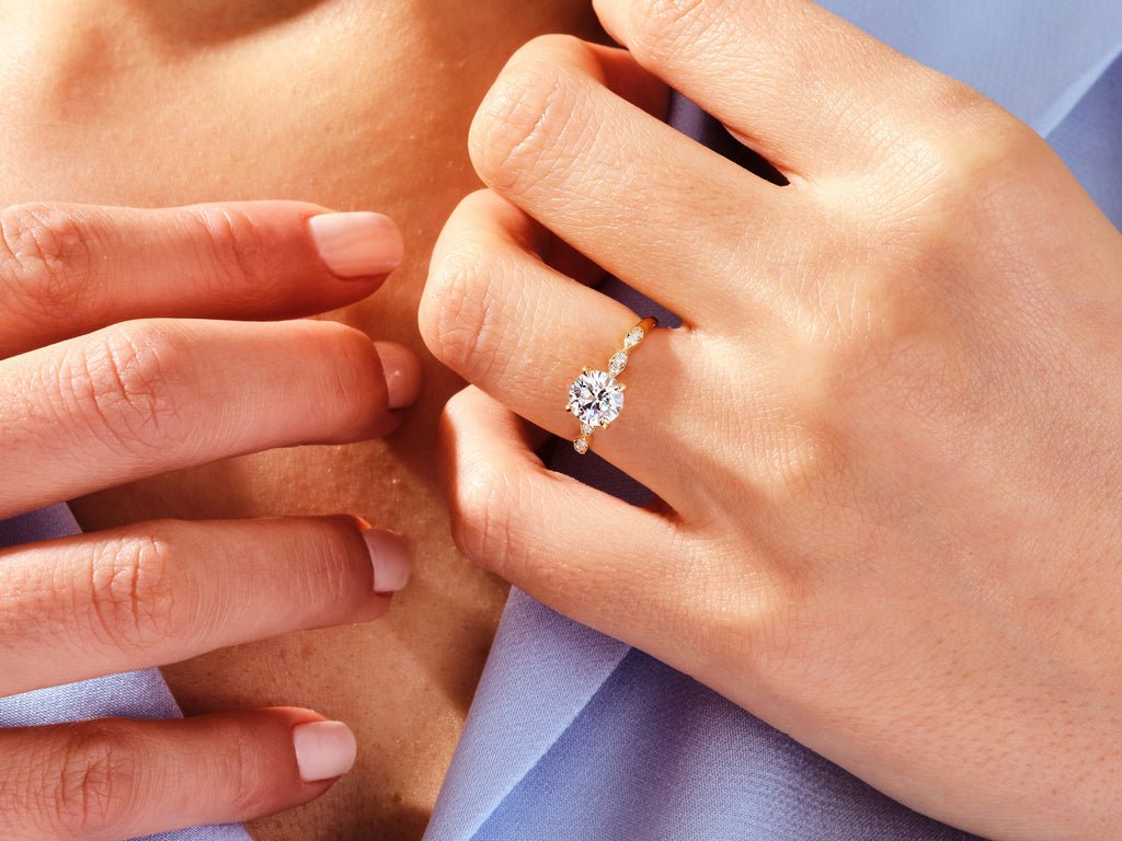 Profile view of round cut vintage engagement ring band