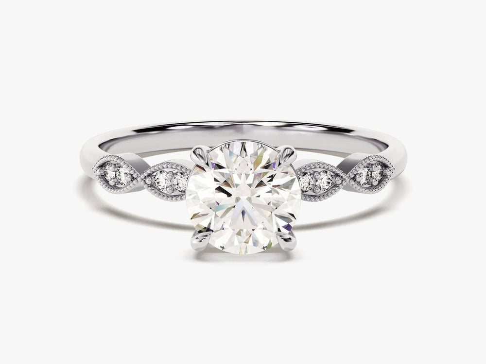 Close-up of round cut center diamond in vintage engagement ring