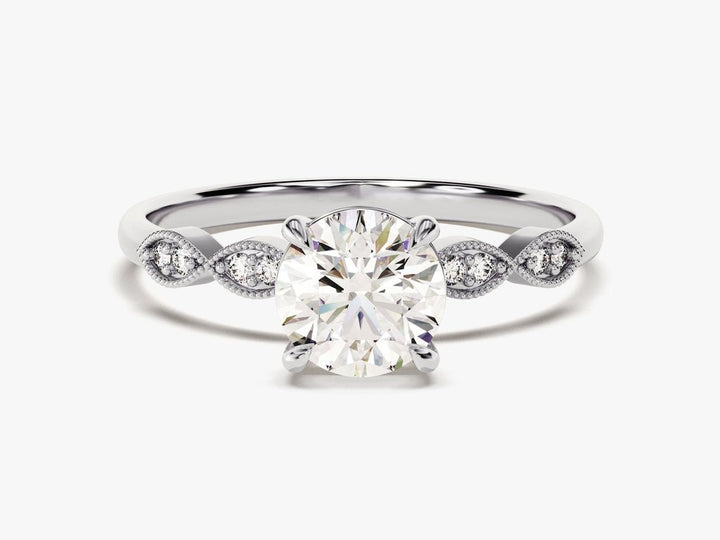 Close-up of round cut center diamond in vintage engagement ring