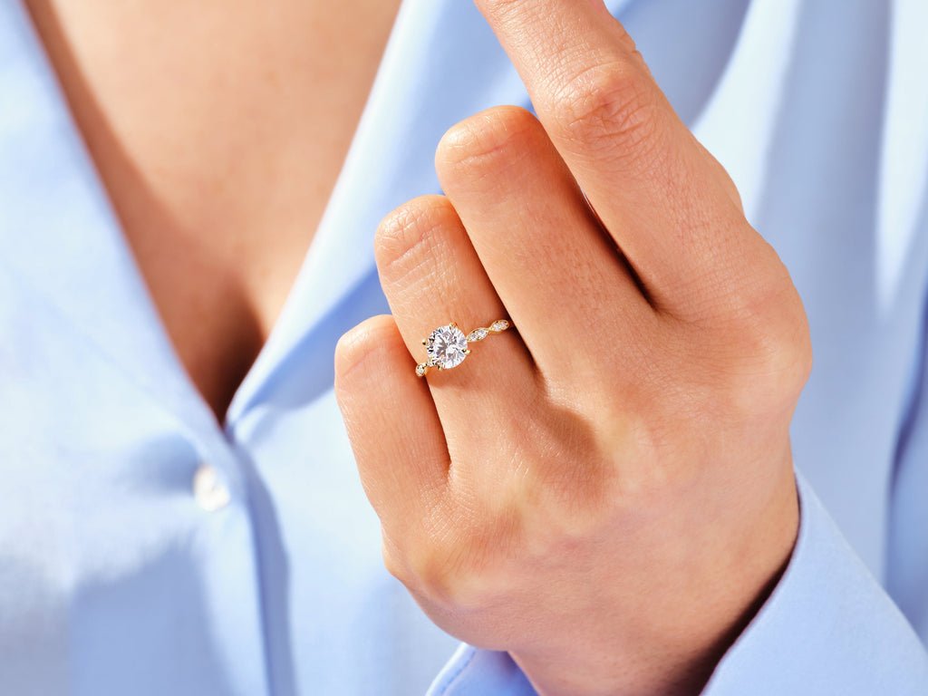 Side angle of round vintage diamond engagement ring