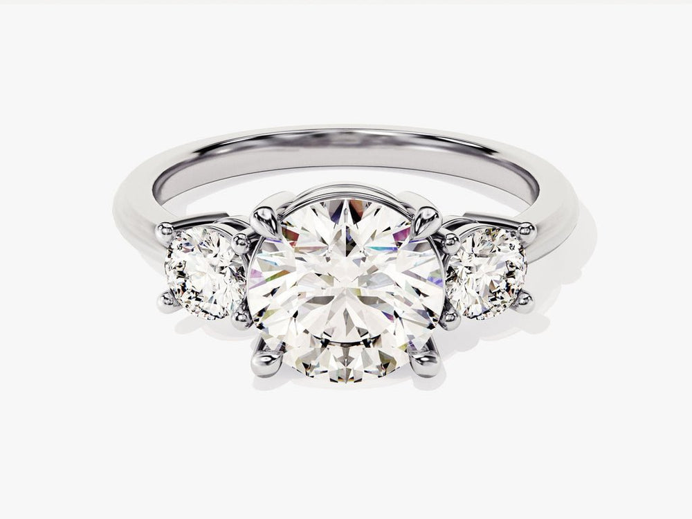 Round three stone engagement ring with brilliant diamond sparkle