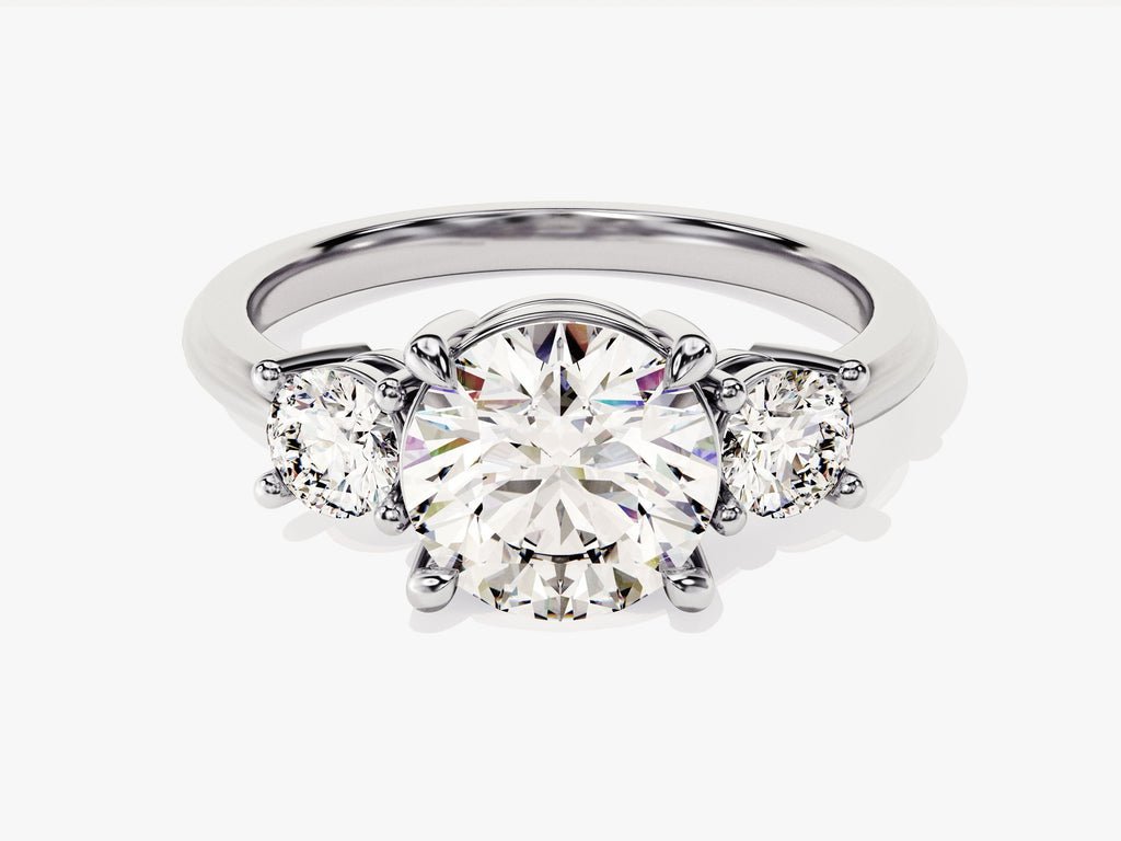 Round three stone engagement ring with brilliant diamond sparkle