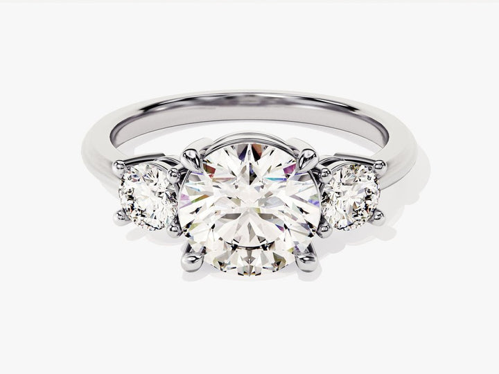 Round three stone engagement ring with brilliant diamond sparkle