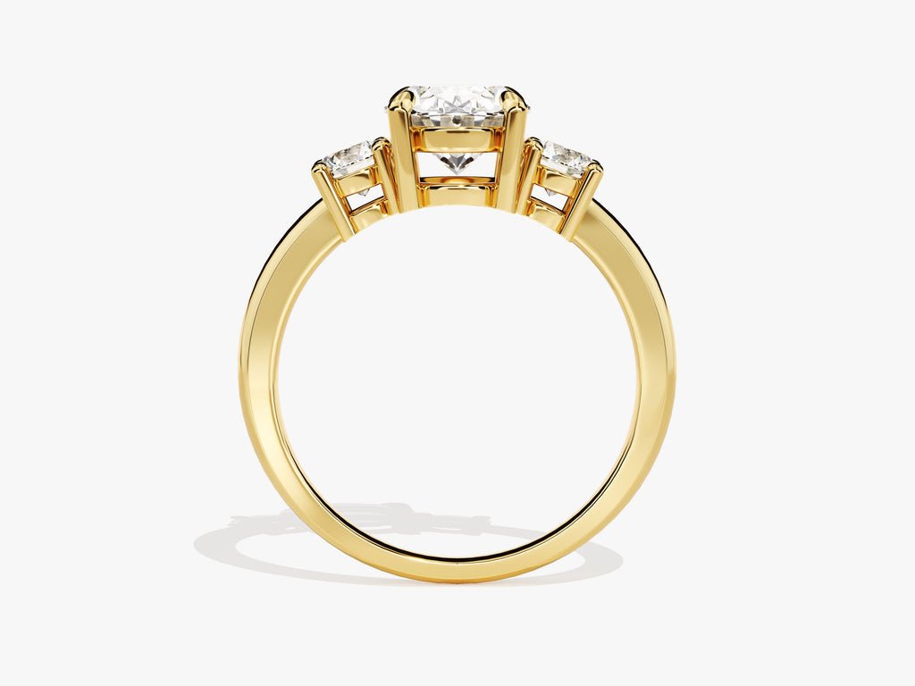 Angled view of oval cut diamond in three stone setting