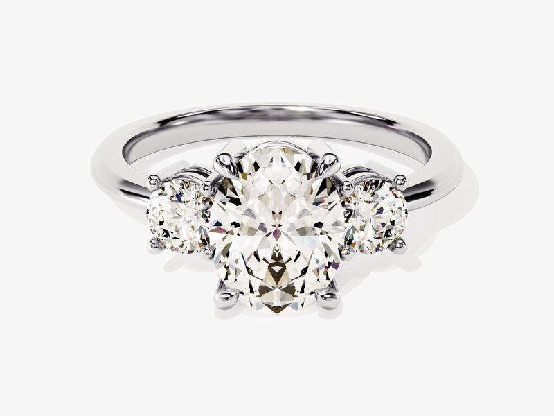 Top-down view of oval cut three stone engagement ring