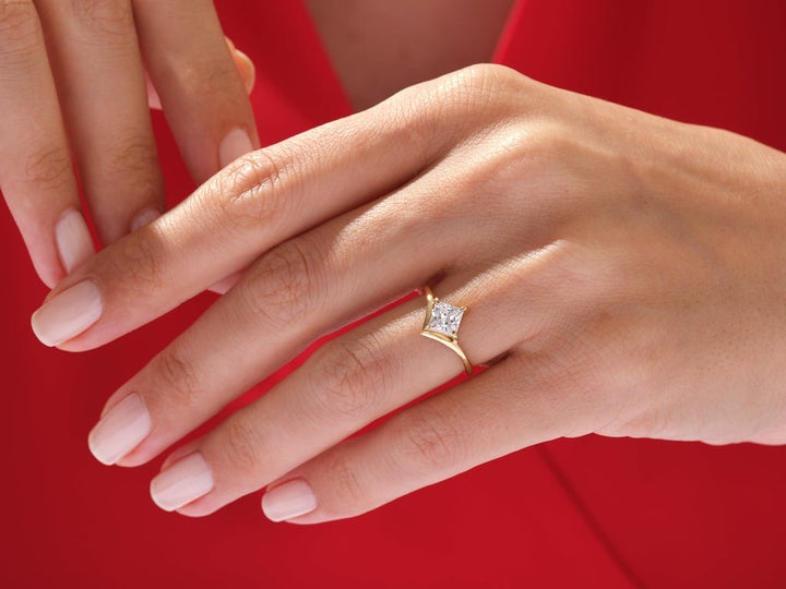 Princess solitaire engagement ring with IGI certificate and packaging