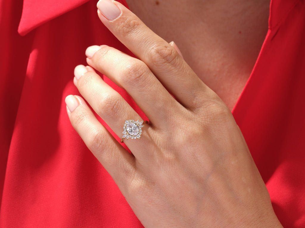 Classic oval cluster engagement ring crafted for everyday wear