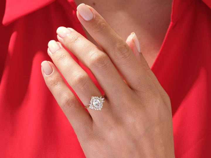 Premium oval cut cluster engagement ring crafted in solid gold