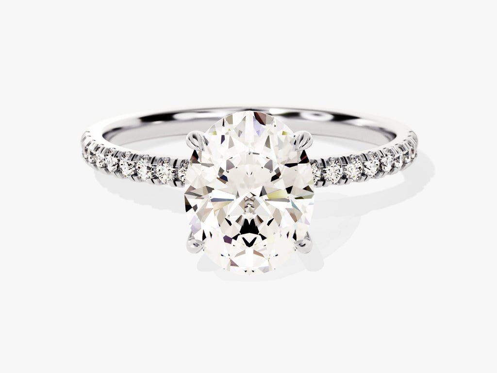 Close-up of oval cut center diamond in hidden halo engagement ring