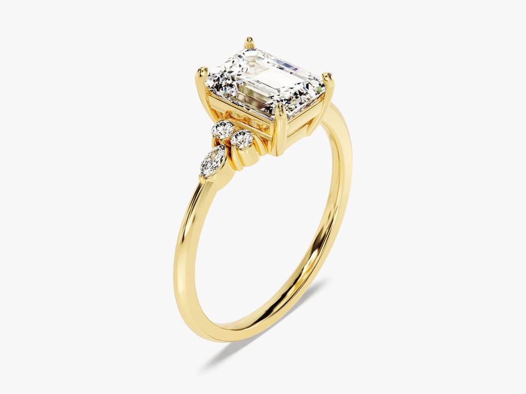 Side angle of emerald cluster diamond engagement ring