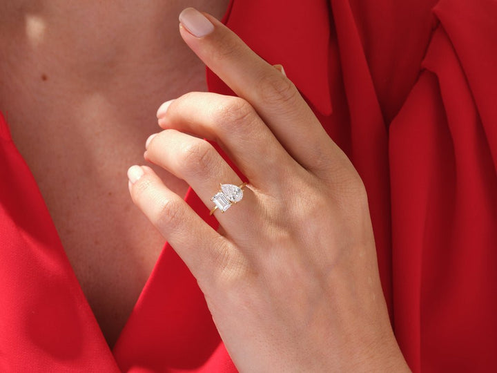 Pear cut diamond ring worn on hand