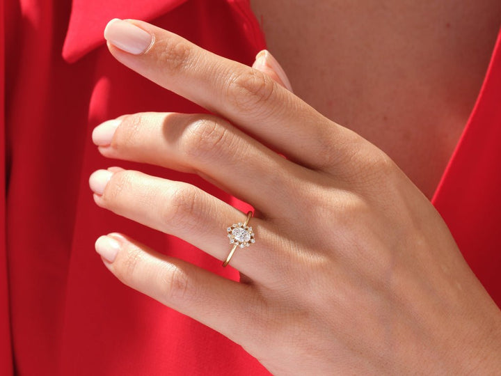 Side angle of oval cluster diamond engagement ring