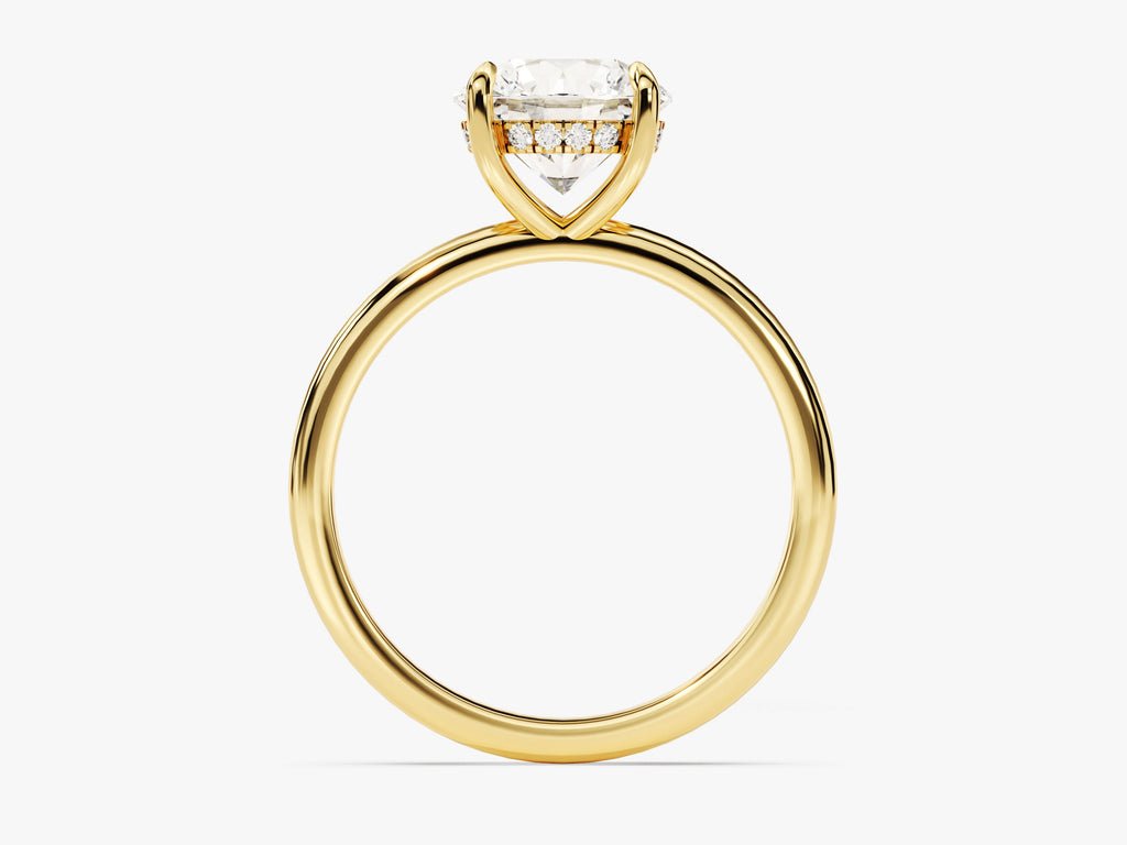 Close-up of round cut center diamond in hidden halo engagement ring