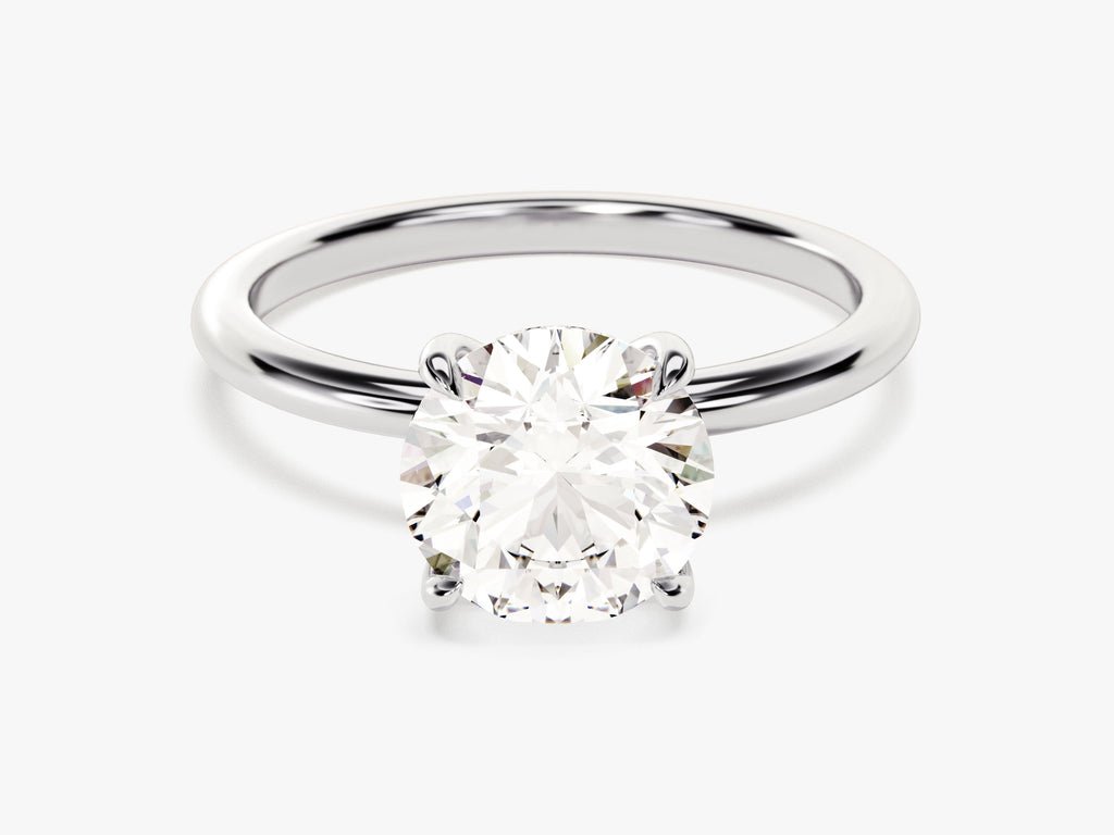 Angled view of round cut diamond in hidden halo setting