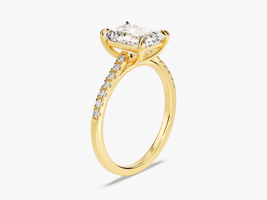Emerald cut engagement ring shown with authenticity certificate