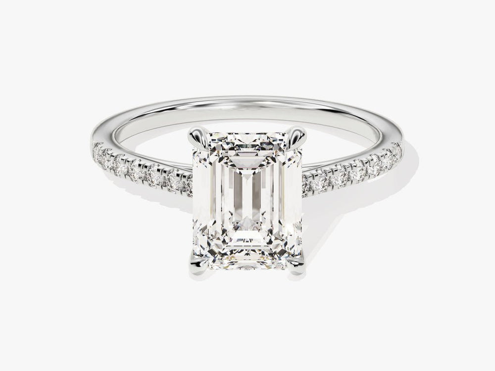 Emerald pave engagement ring offered in gold and platinum