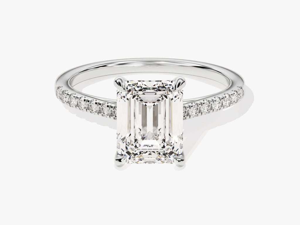 Emerald pave engagement ring offered in gold and platinum