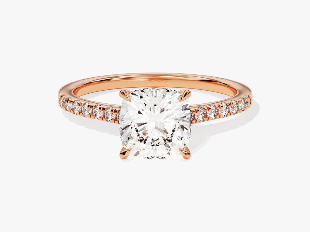 Cushion pave engagement ring shown on hand for true-to-life sizing