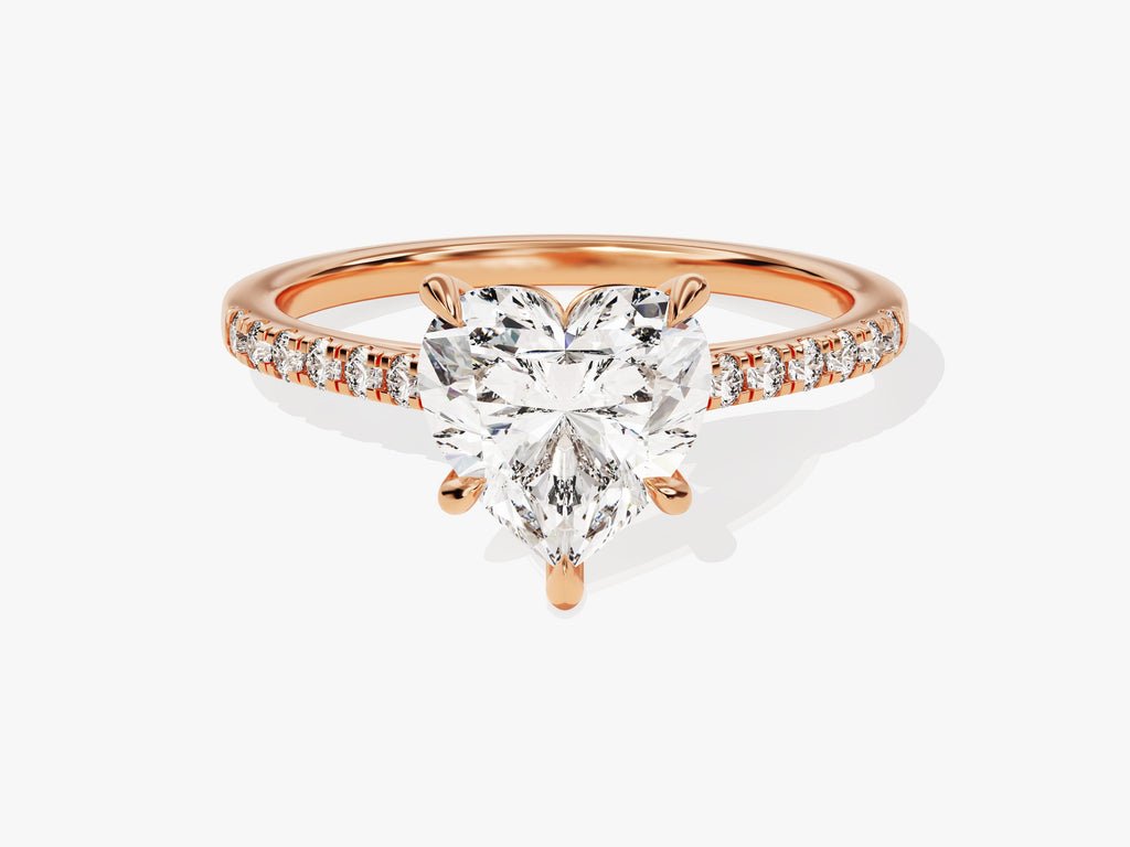 Heart pave engagement ring offered in gold and platinum