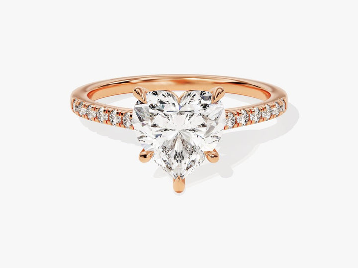 Heart pave engagement ring offered in gold and platinum