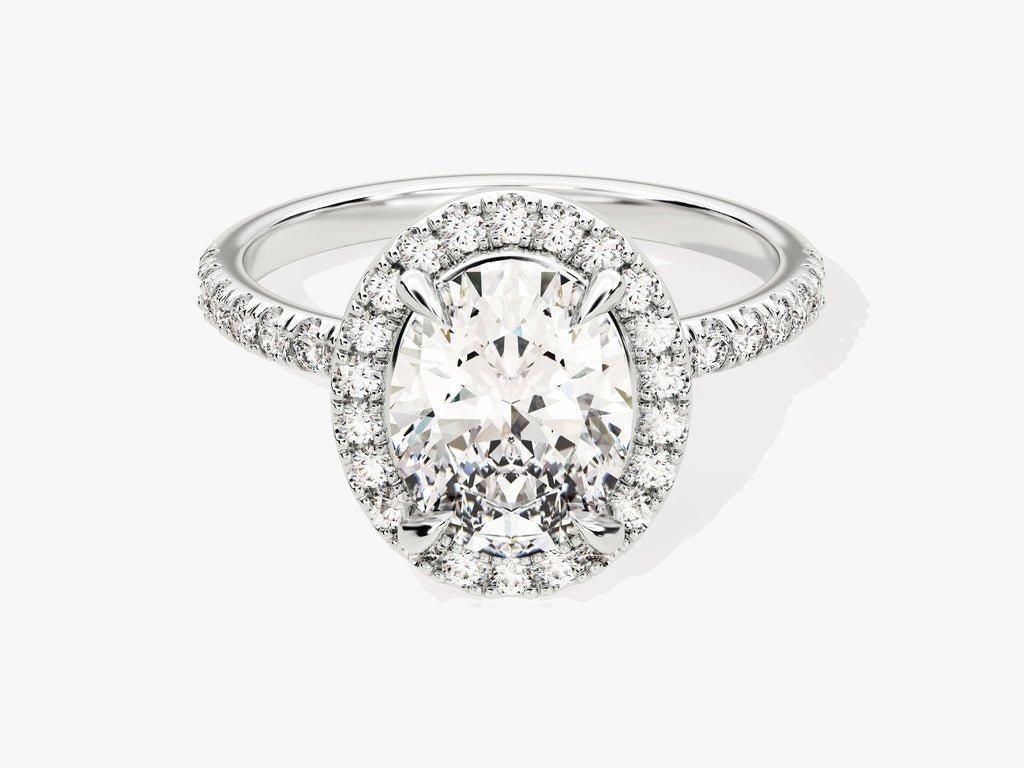 Oval pave engagement ring offered in gold and platinum