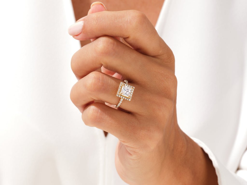 Princess pave engagement ring shown on hand for true-to-life sizing