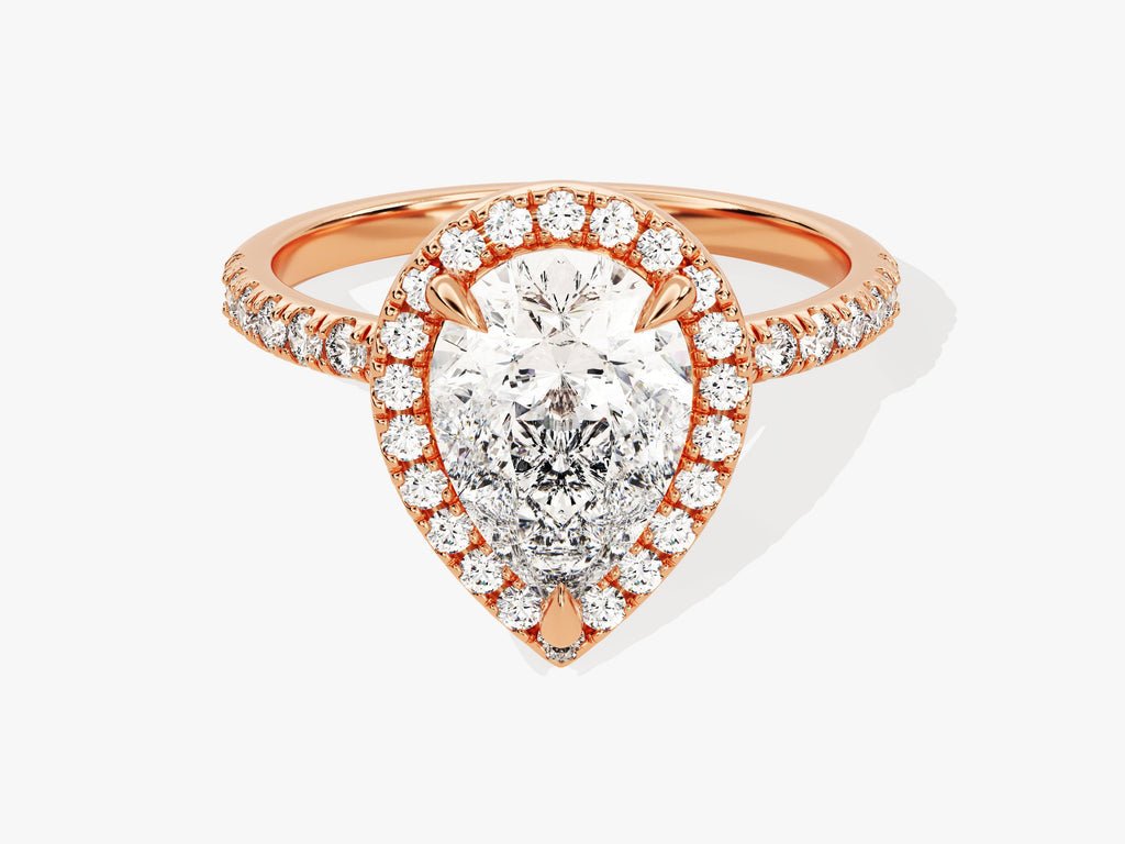 Lifestyle shot of pear pave diamond ring on hand