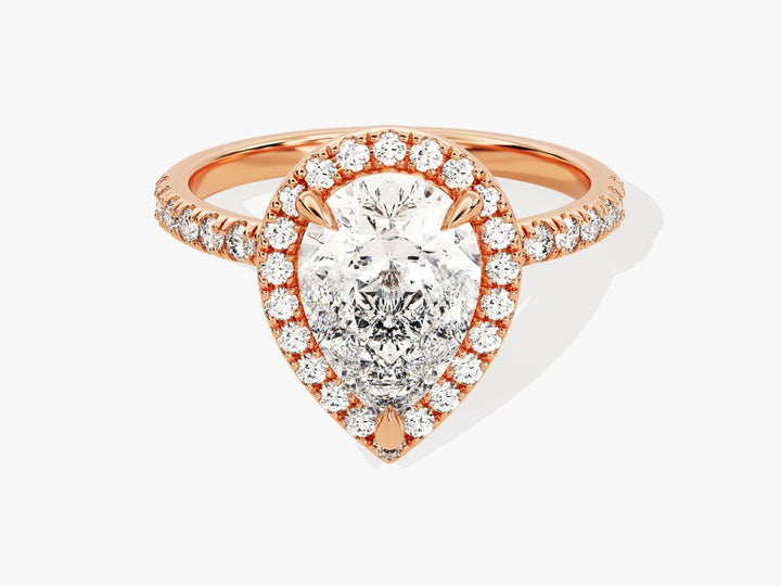 Lifestyle shot of pear pave diamond ring on hand