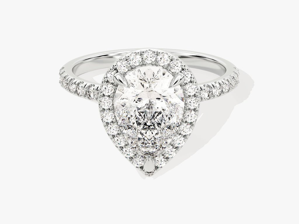 Pear cut pave engagement ring shown in real-life wear