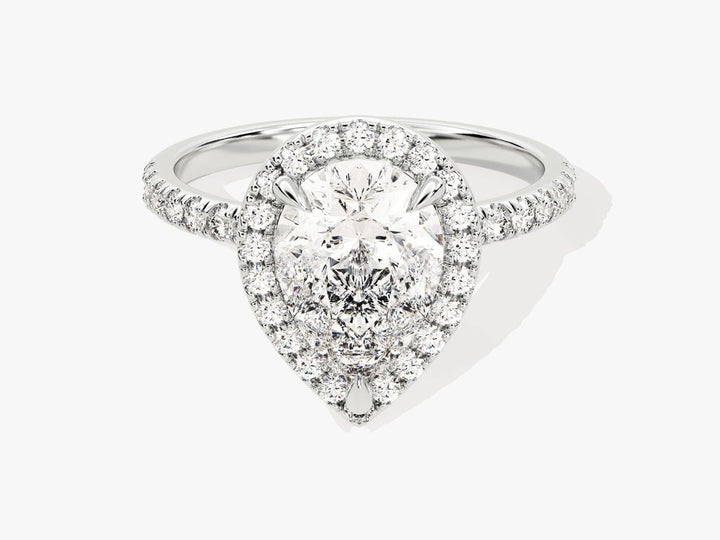 Pear cut pave engagement ring shown in real-life wear