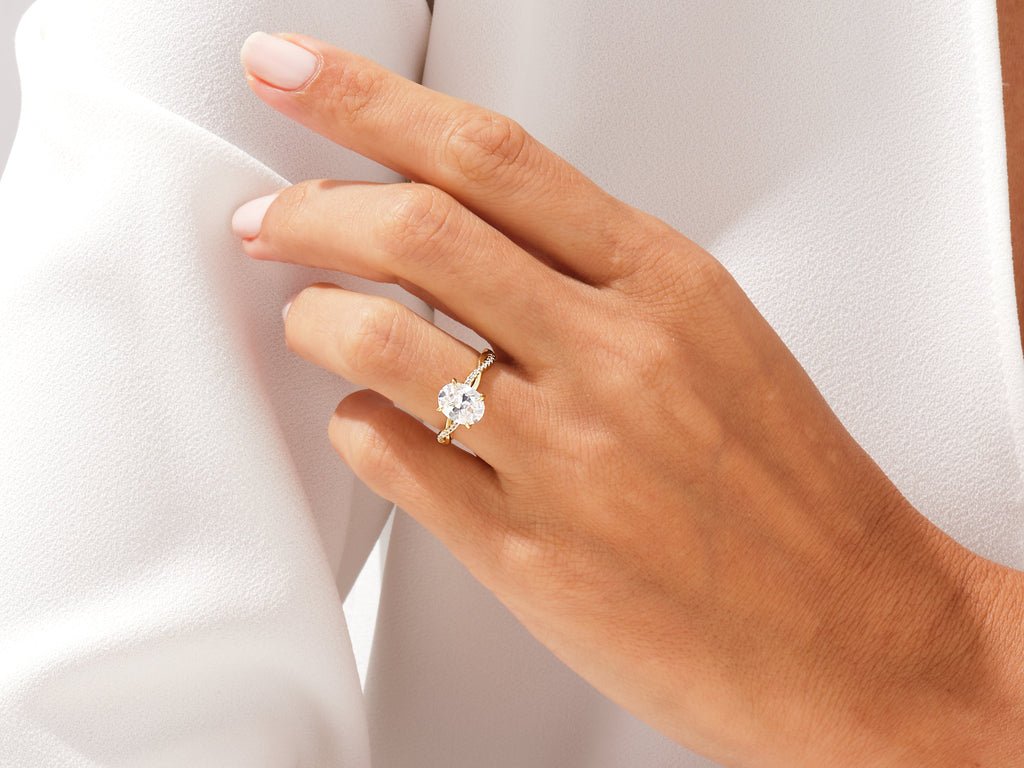 Oval pave diamond engagement ring available in multiple metals