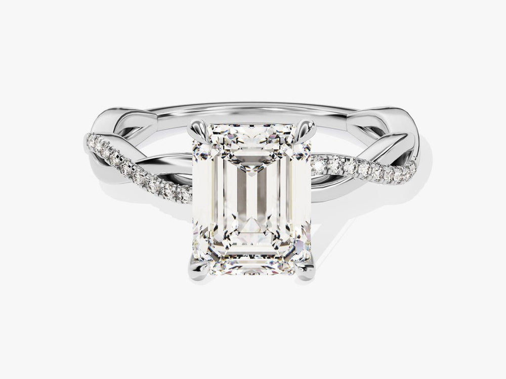 Side angle of emerald solitaire diamond engagement ring