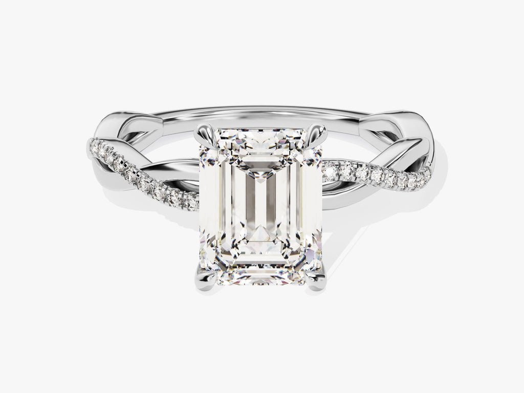 Side angle of emerald solitaire diamond engagement ring