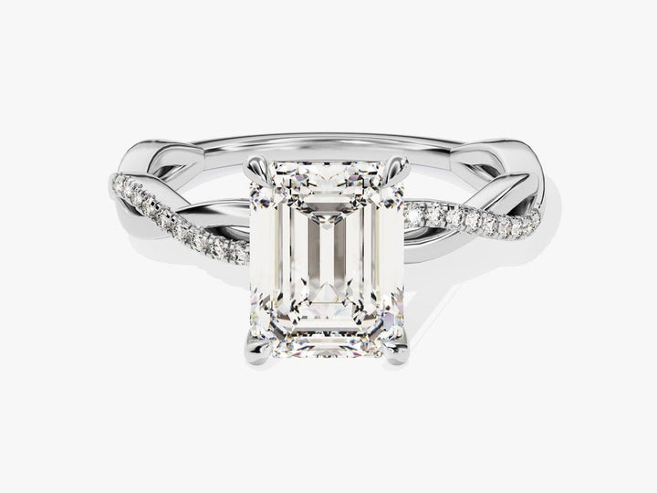 Side angle of emerald solitaire diamond engagement ring