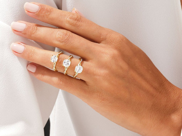 Cushion cut engagement ring side view showing band detail
