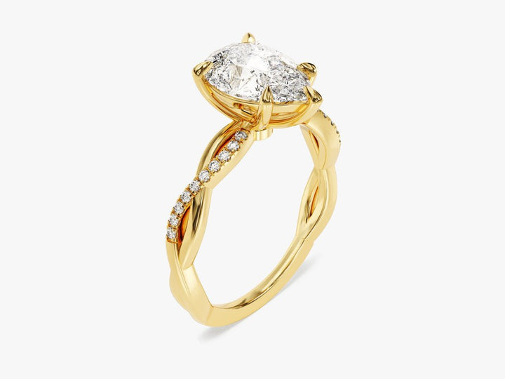 Pear pave engagement ring viewed from the side