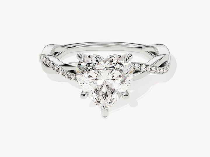 Heart cut diamond ring worn on hand