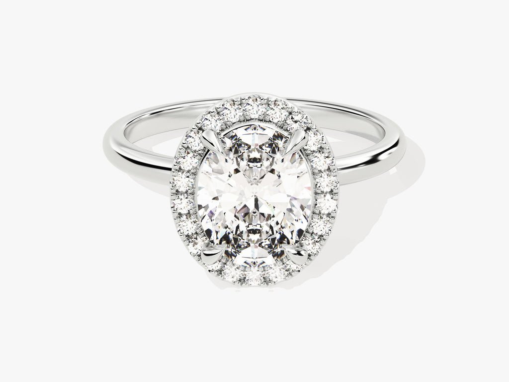 Oval halo engagement ring close-up highlighting diamond sparkle