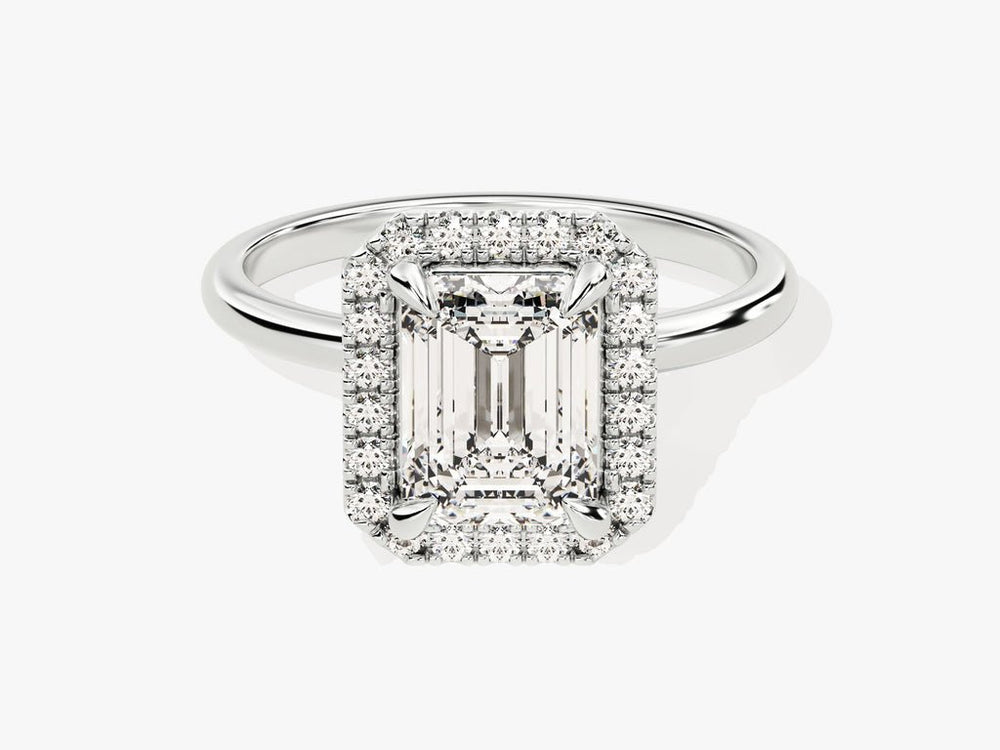 Emerald cut halo engagement ring with IGI certified center diamond