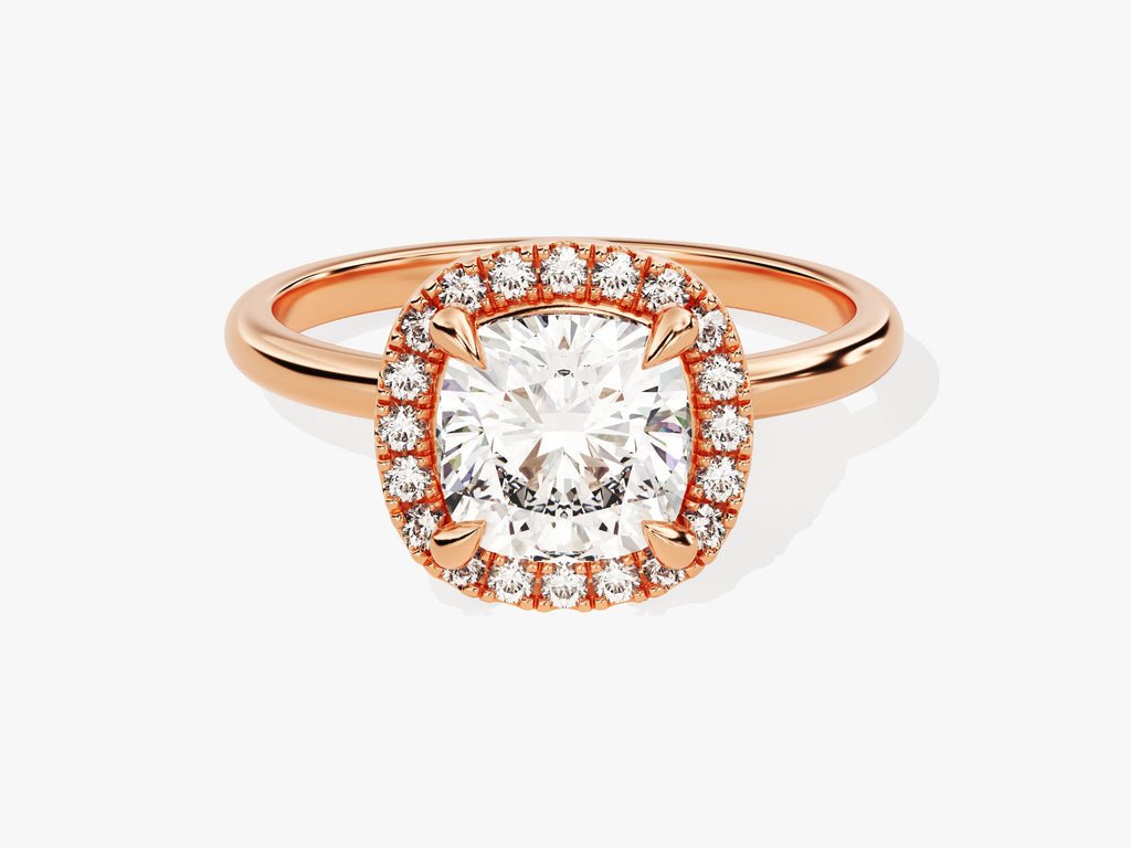 Cushion cut halo engagement ring shown in real-life wear