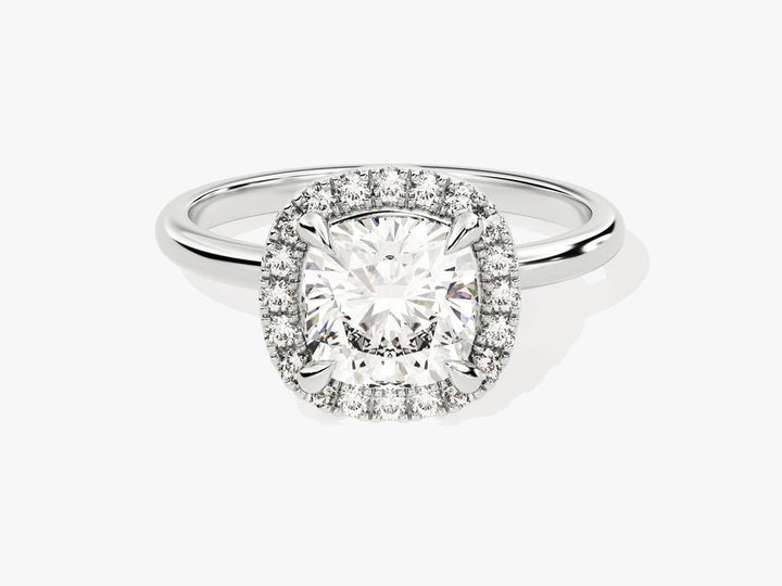Cushion halo lab grown diamond ring fitted on finger