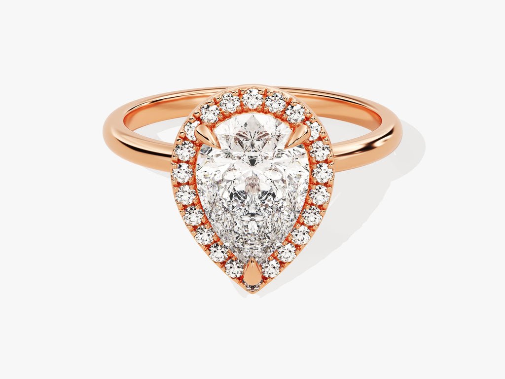 Top-down view of pear cut halo engagement ring